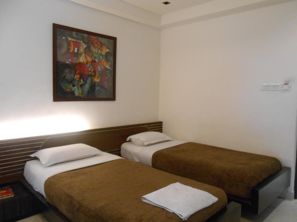 Hotel Victerrace Regency Колката Номер фото