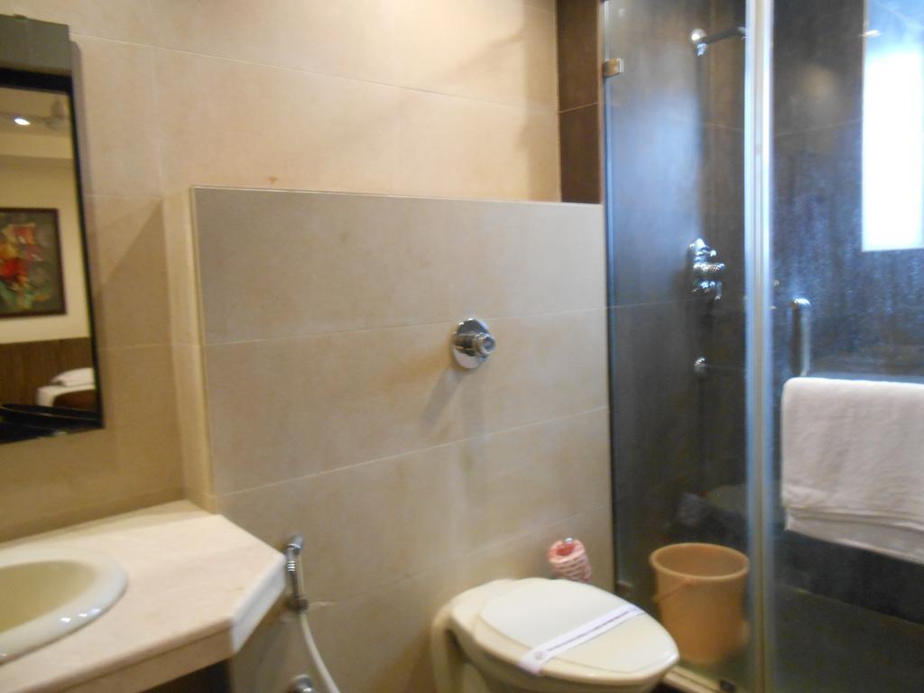 Hotel Victerrace Regency Колката Номер фото